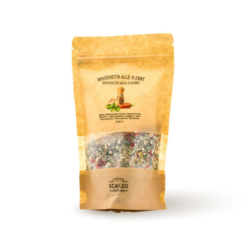 Bruschetta alle 11 Erbe Scalzo Calabria - busta doypack da 80 grammi contenente un mix di undici erbe e verdure selezionate a mano, ideale per arricchire bruschette e marinature con un'esplosione di sapori.