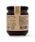 Retro del vaso da 230 grammi di Confettura di Uva Fragola Scalzo Calabria, con lista ingredienti e valori nutrizionali.