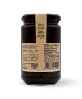 Retro del vaso da 340 grammi di Confettura di Uva Fragola Scalzo Calabria, con lista ingredienti e valori nutrizionali.