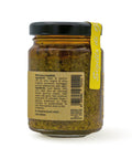 Retro del vaso da 90 grammi di Pesto Genuino Scalzo Calabria, con lista ingredienti.